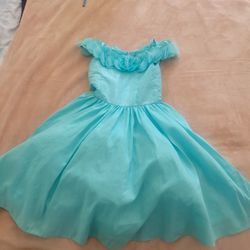 Size 7/8 year old, cyan/baby blue floweral girls dress