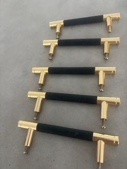 5 drawers handles  with leather grip in the middle .. 4” bet screws.. $30 for all