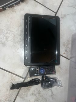 NAVISKAUTO Portable DVD Player – Complete & Working
