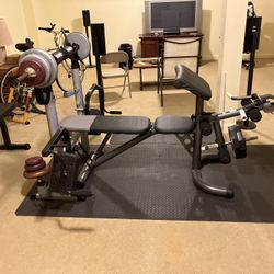 Weight Bench, w/ Barbell & Weights for multifunctional workouts.