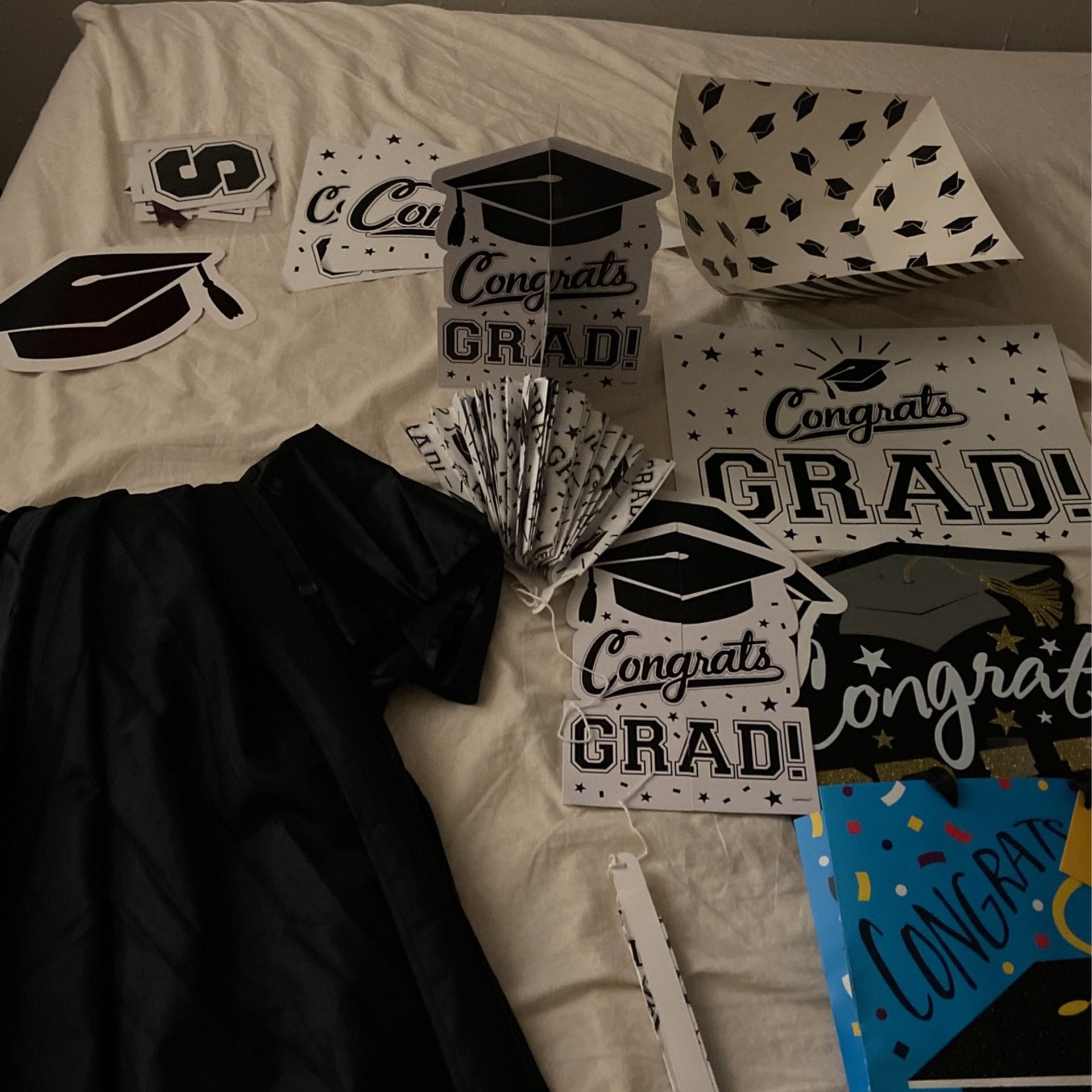 Gown and a lot of graduation ornaments