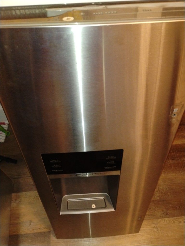 Samsung side by side refrigerator left door with depensor