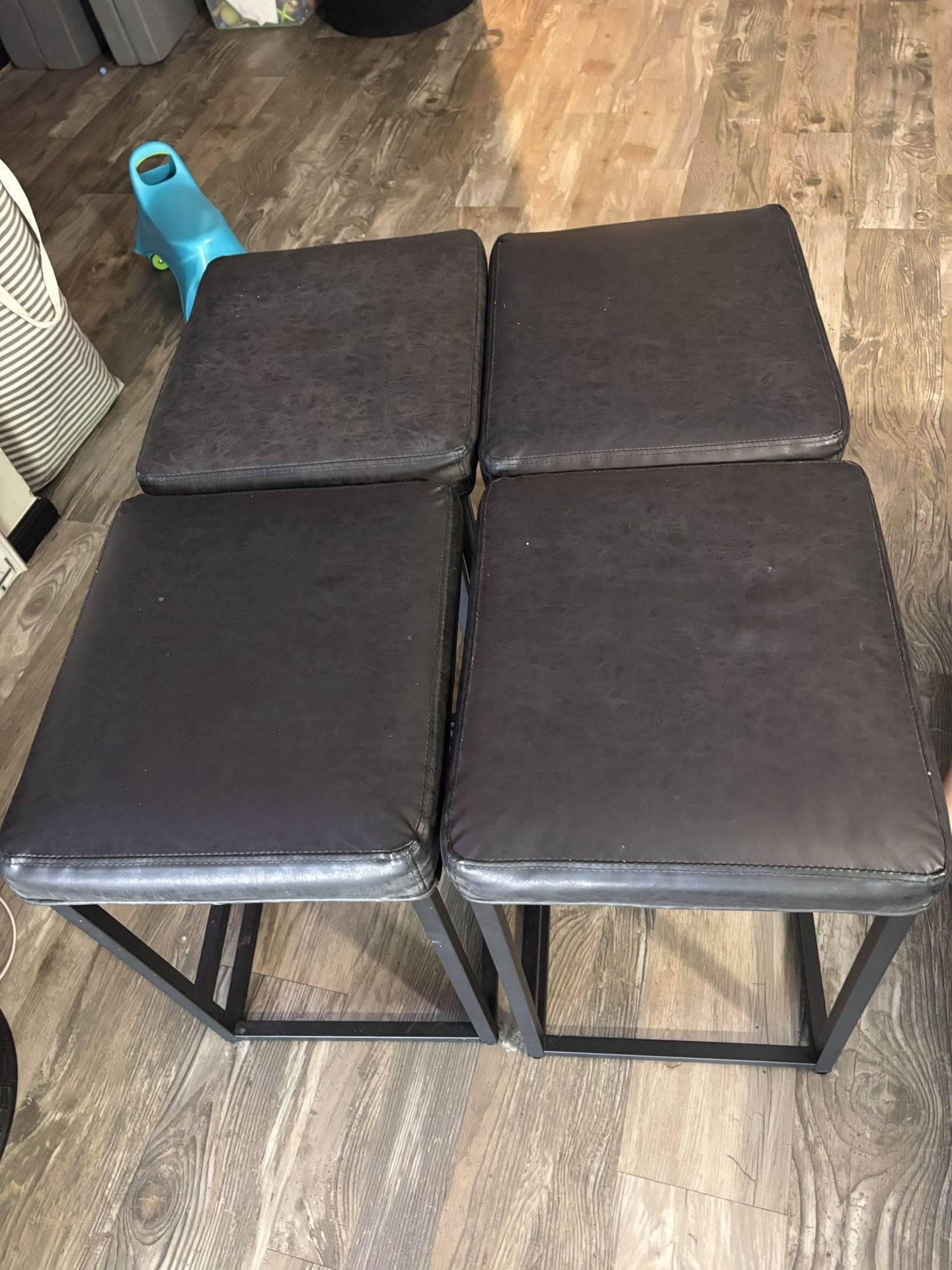 4 Black Cushioned Bar Stools 