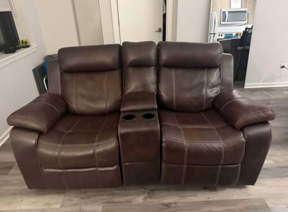 brown leather couch/loveseat