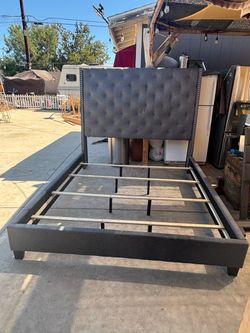 Gray tufted king platform