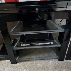 Corner TV stand,glass shelves. 