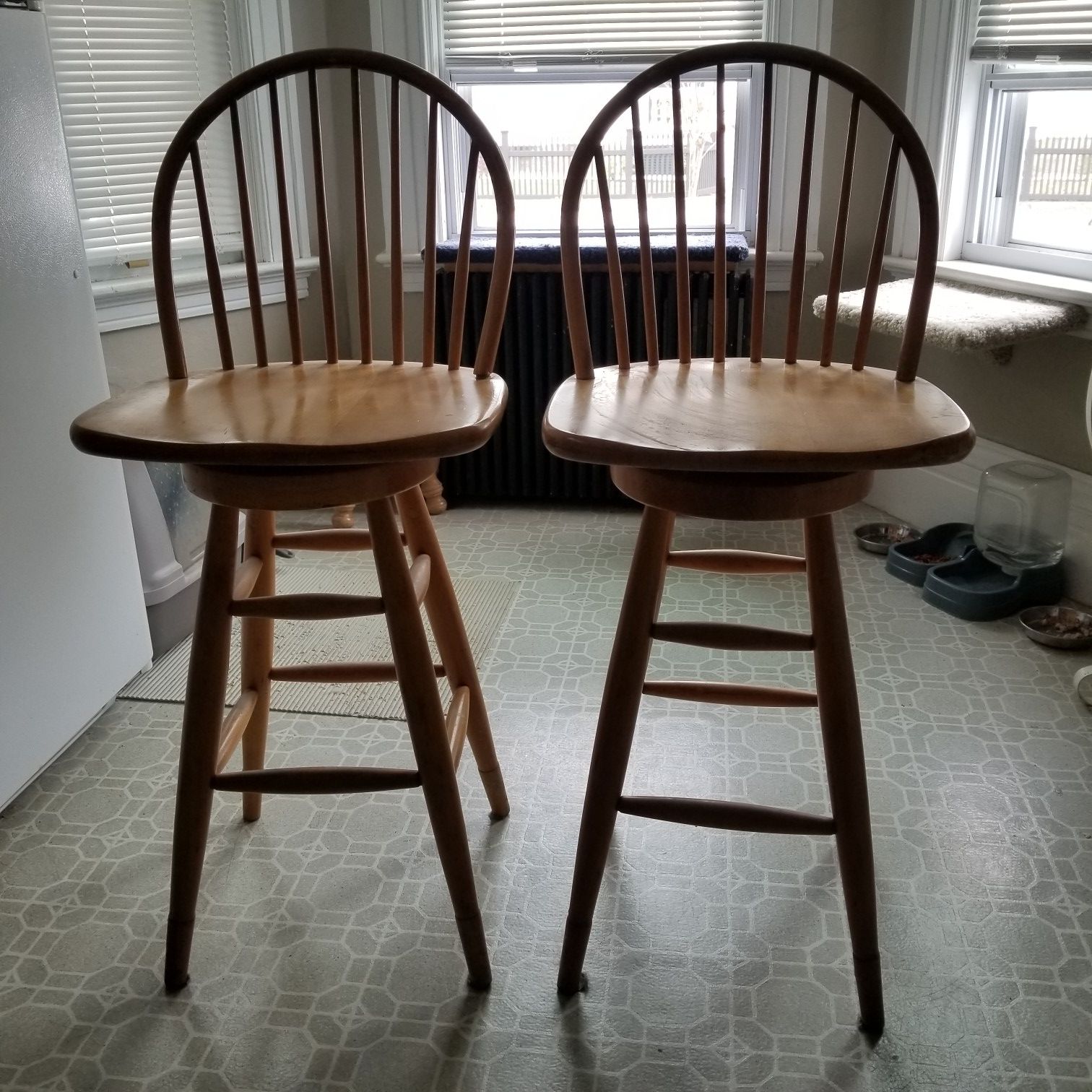 A pair of stools chairs