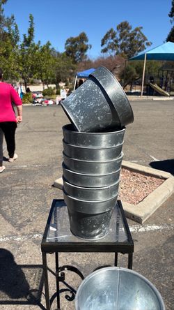 Galvanized plant containers 7 large and 5 smaller