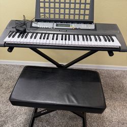 Yamaha EZ-200 Portable Keyboard, Stand And Seat. 