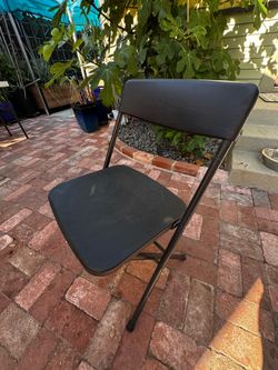 7 Cosco Black Folding Chairs