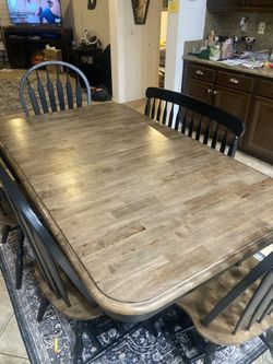 Brown And Black Dinning Table