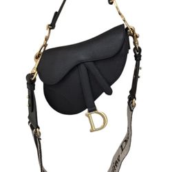 Women's handbag with dust bag and box—excellent quality.