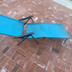 Two Folding Lounge Chairs