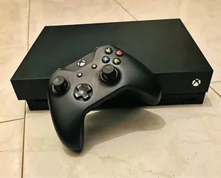 Xbox One X Used In + Warranty Excellent Condition