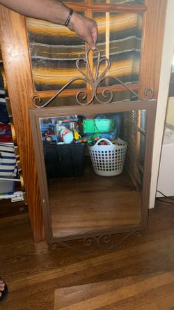 brown metal mirror