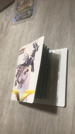 A pack of 6 card savers in an mini Pokémon binder