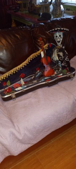 An Art Piece Mariachi In A Violin Case