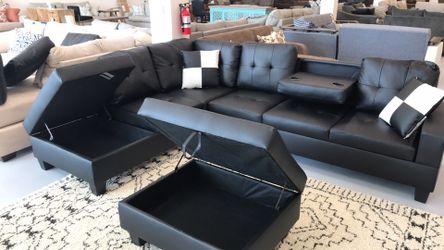 Functional Black sectional with tray and storage ottoman