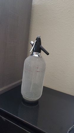 COLLECTORS ITEM - Soda Siphon Seltzer Bottle with Wire Mesh Metal Around Glass - Antique