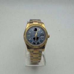 Gold-Tone Watch with Fluted Bezel and Date Window