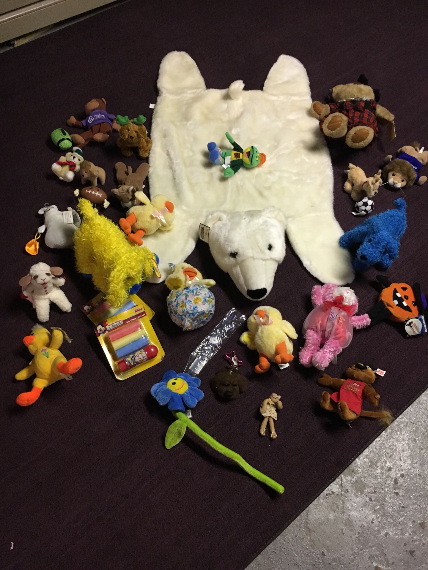 Bear rug and stuffed animals