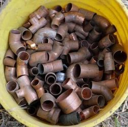 Scrap copper pipe and fittings plus brass
