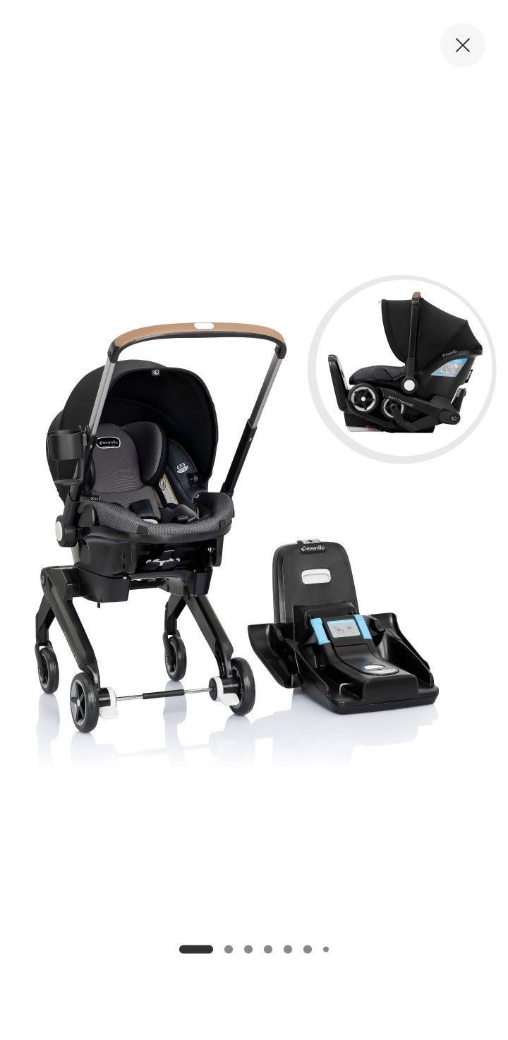 Gray Evenflo Shyft DualRide Travel System with Carryall Storage