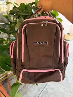 JuJuBe baby diaper bag with lots of compartments sellling as it