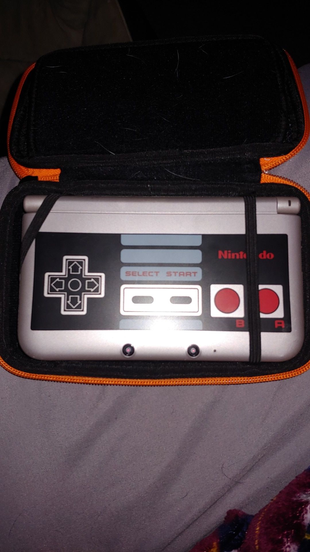 3DS XL with Nes controller on it, includes 10 games