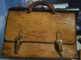Vintage leather briefcase and notebook