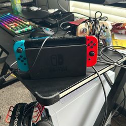 Nintendo Switch 32GB Handheld Console - Neon Red/Neon Blue