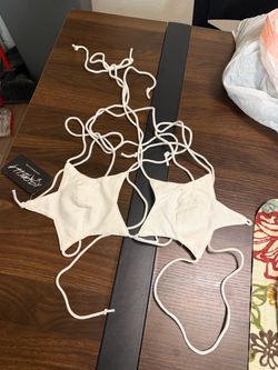 Top cream color size L runs small NWT