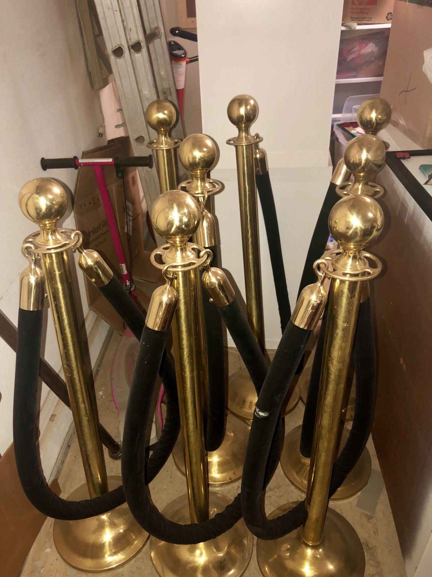 8 brass stanchions with black velvet rope