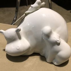 Mama and baby hippo bank