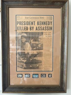 JFK assassination newspaper with mint condition stamps in a beautiful custom frame