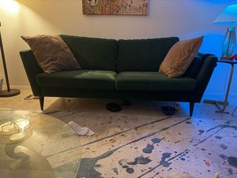 Green velvet sofa