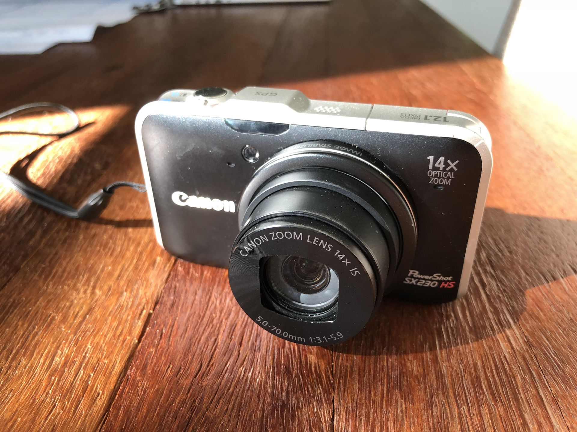 Canon PowerShot SX230 HS 12.1 MP CMOS Digital Camera with 14x Zoom, Full HD Video, case and extra battery included