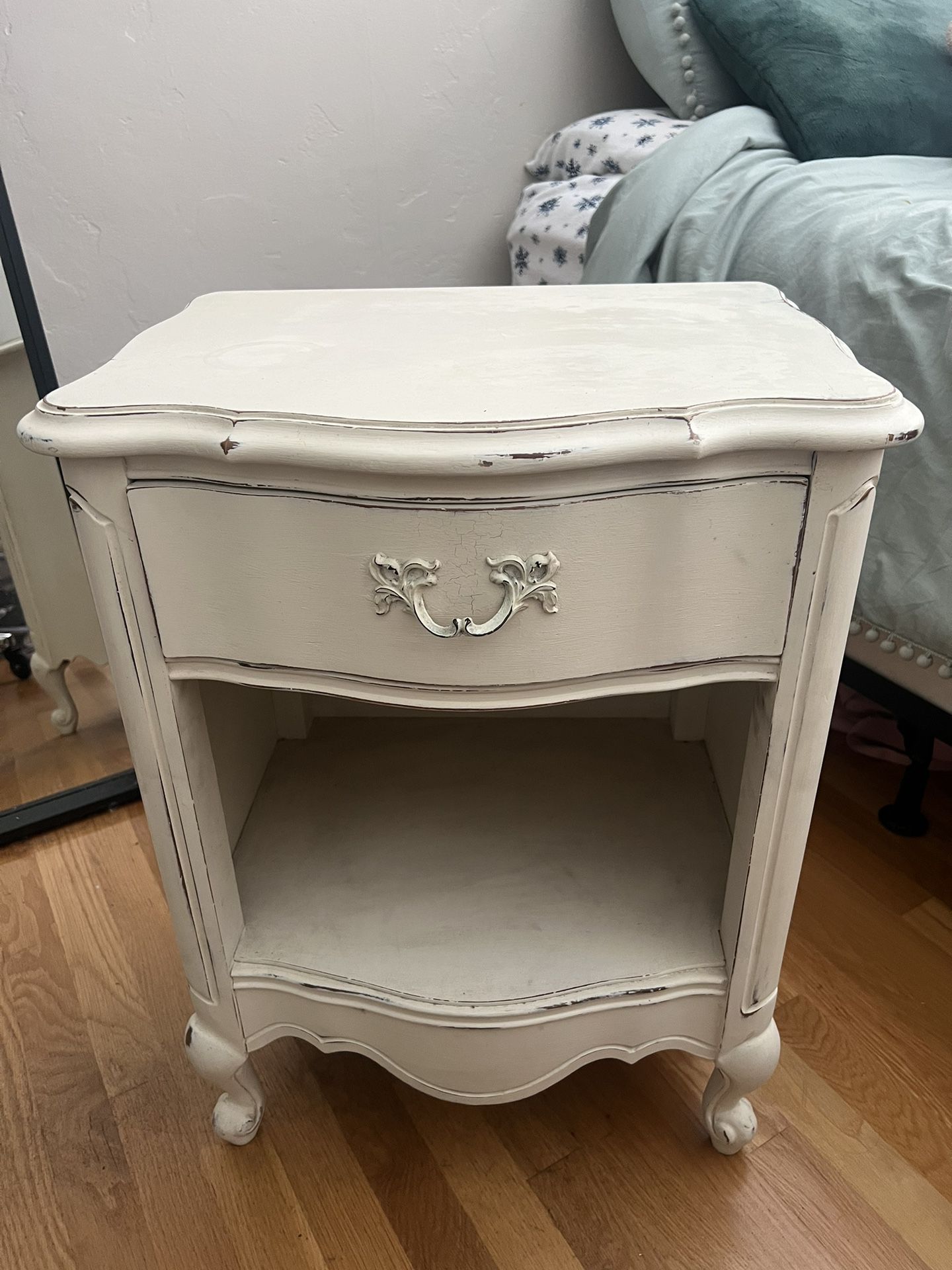Distressed Cream-Colored Bedside Table