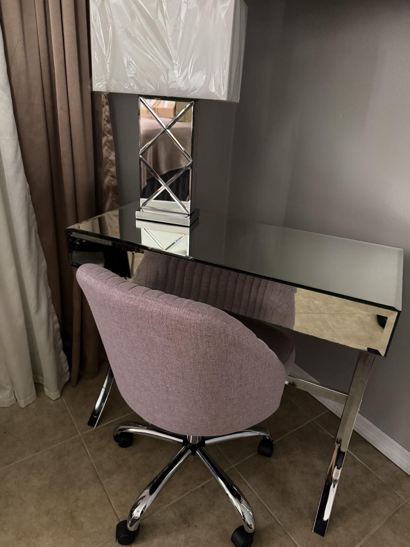 Mirror console table with lamp and chair