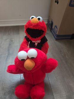 2 Classic Tickle me Elmo's