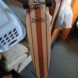 Deviate L train Skateboard 47"