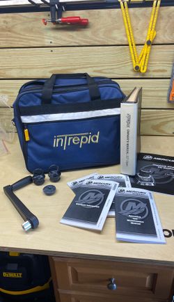 Intrepid 327 owners bag with manual