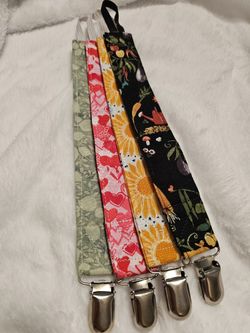 Pacifier clips