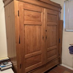 Solid Wood Armoire With Locking Door. 