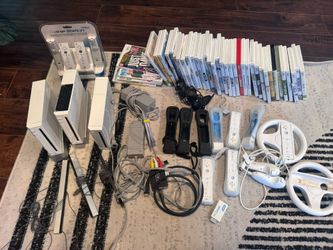 3 Working Wii Consoles. And Many Accesories 