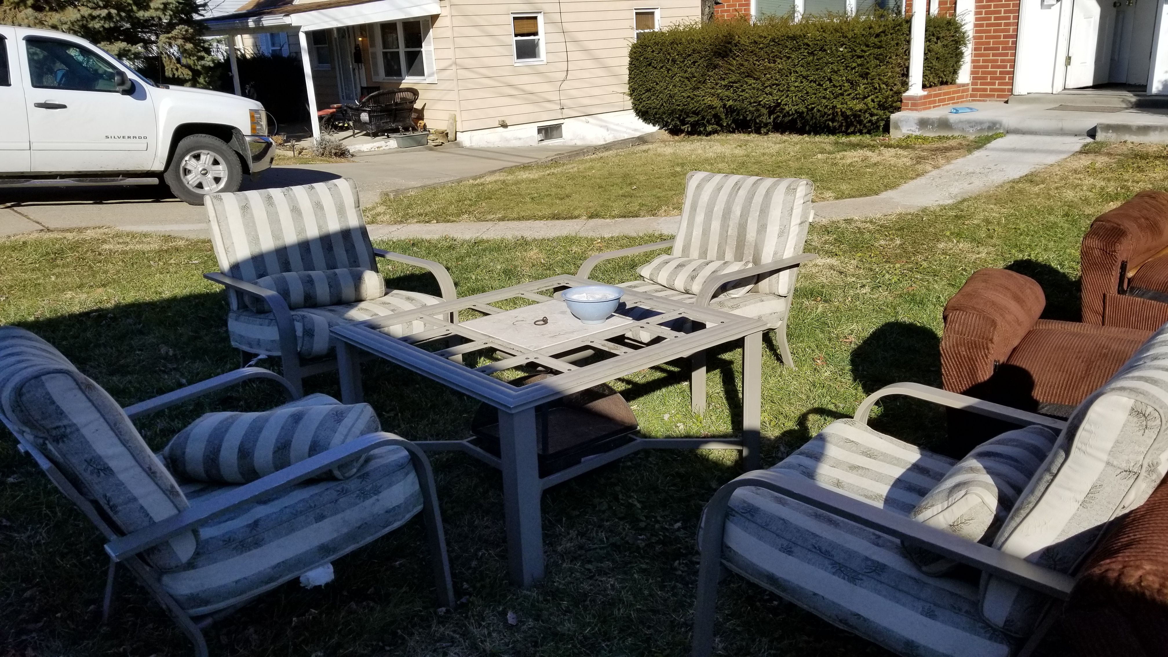 Patio table with fire pit and 4 chairs
