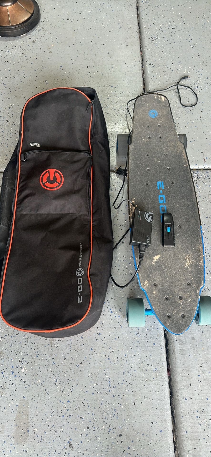 The image shows a used Yuneec E-GO2. electric longboard