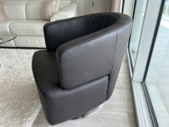 Two brown chairs