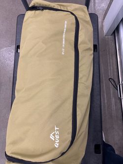 Quest 10' x 15' 10P Convertible Screen Room Cabin Tent, packed inside its zippered storage duffel