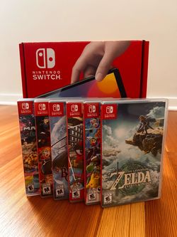 Nintendo Switch OLED Bundle + 6 Games - $450